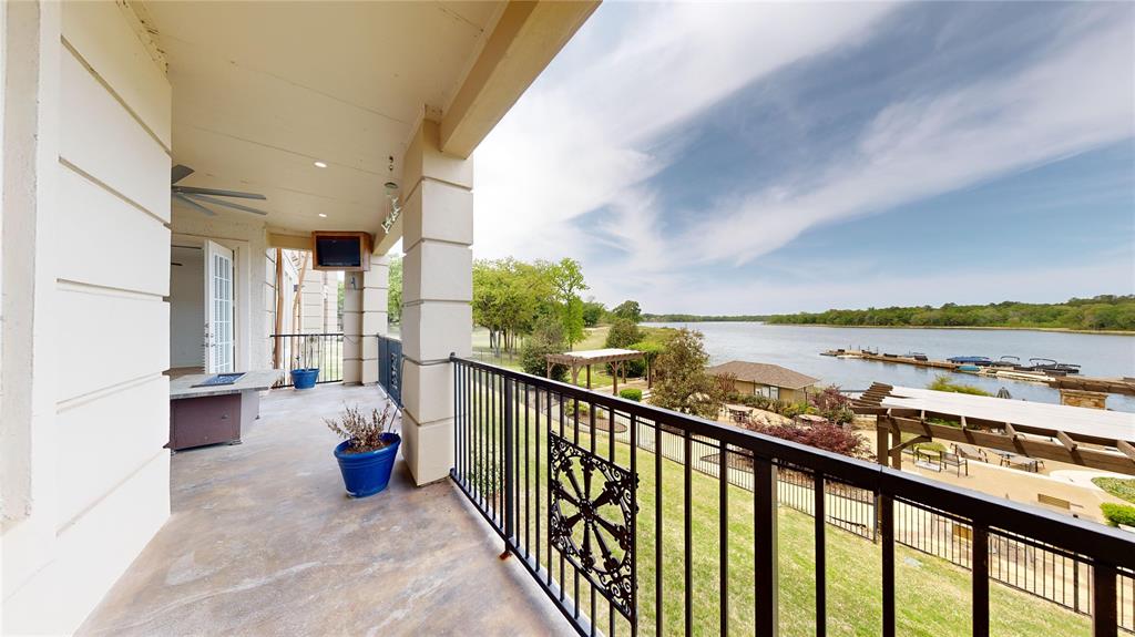 a view of balcony with furniture