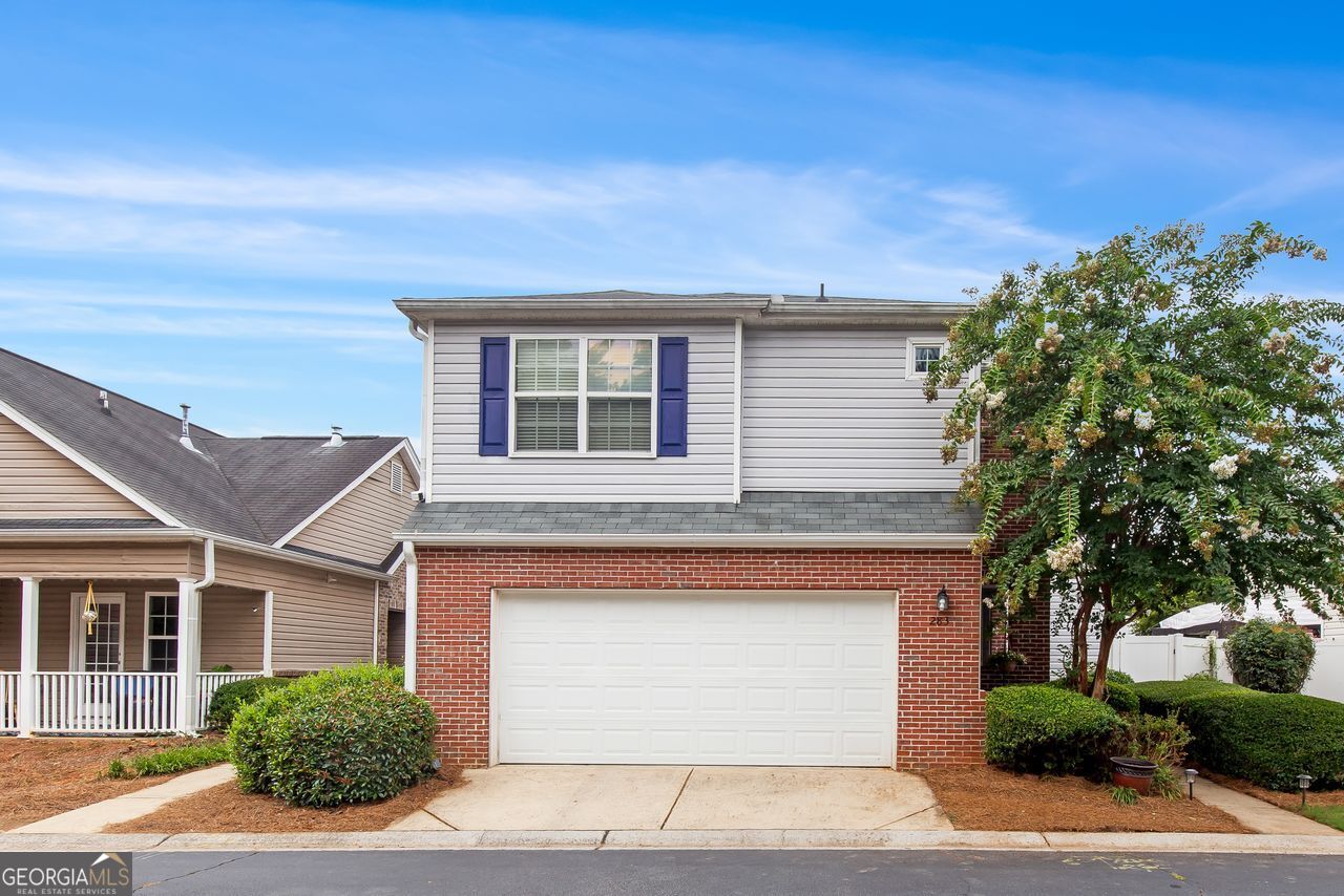 front view of a house with a garage