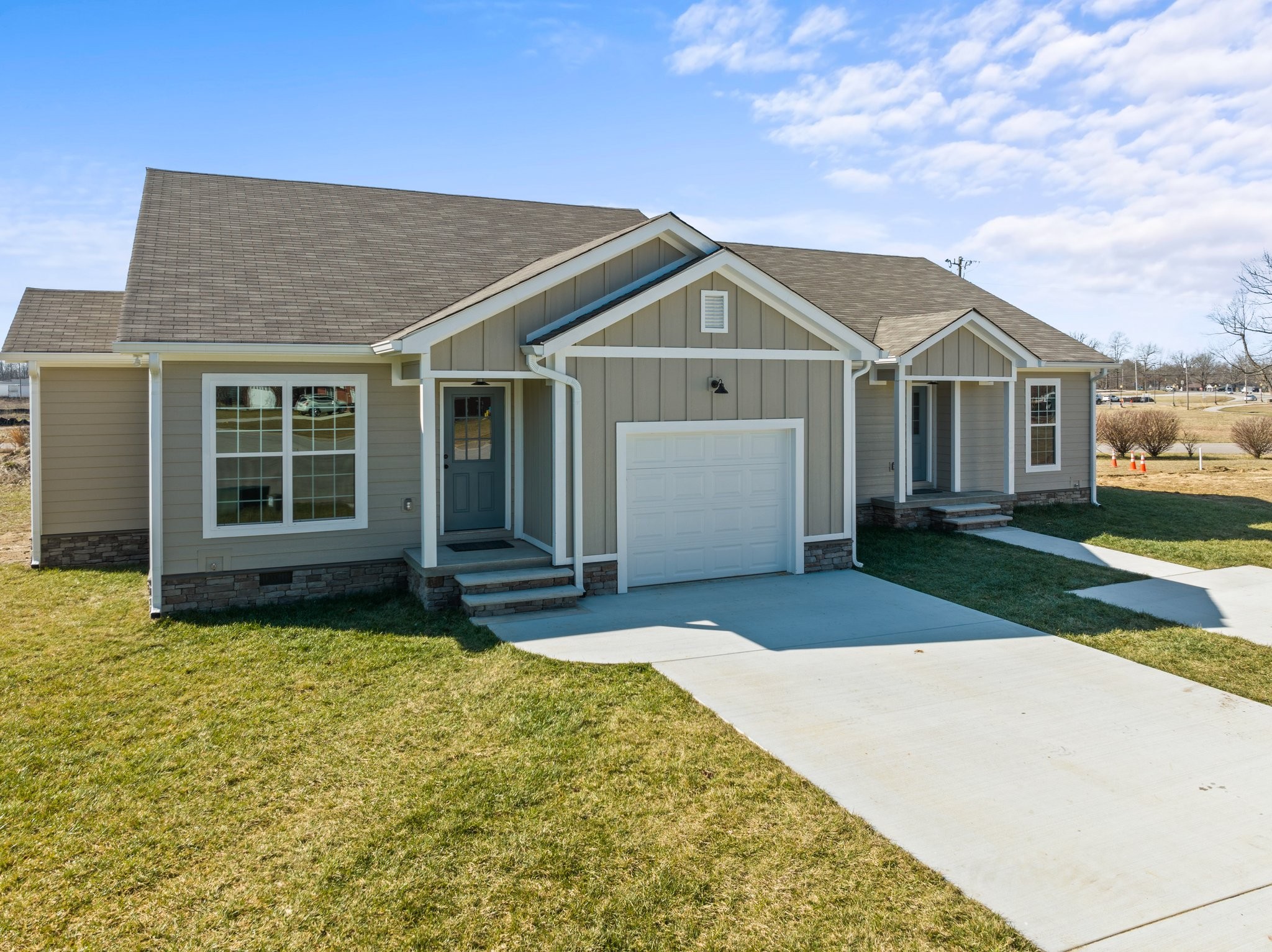 a front view of a house with a yard