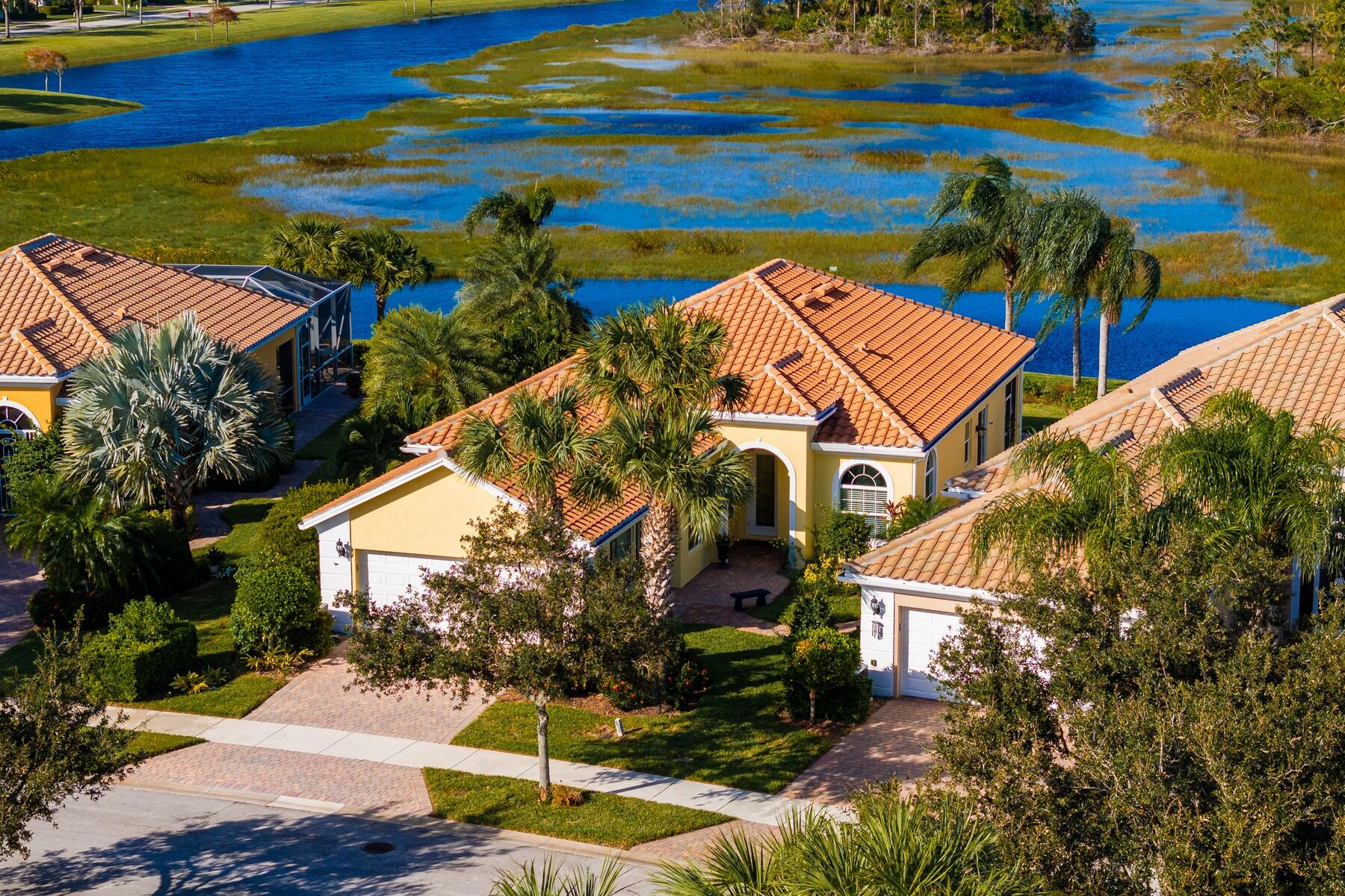 a aerial view of a house with a yard