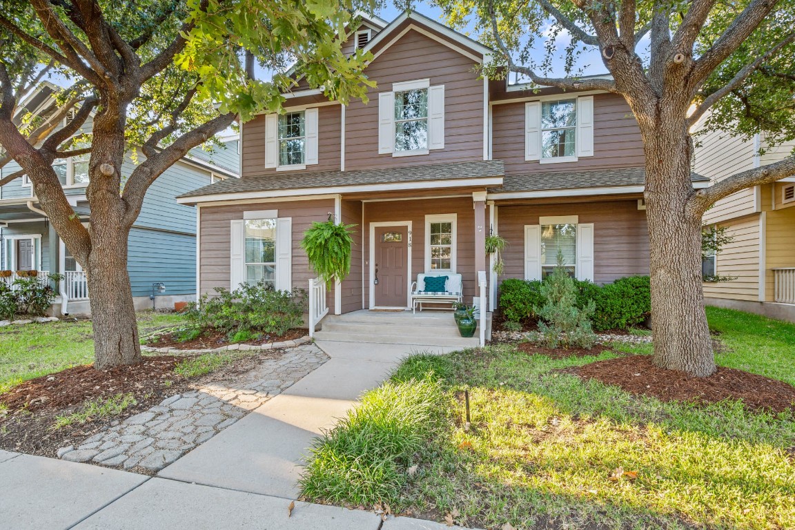 front view of a house with a yard