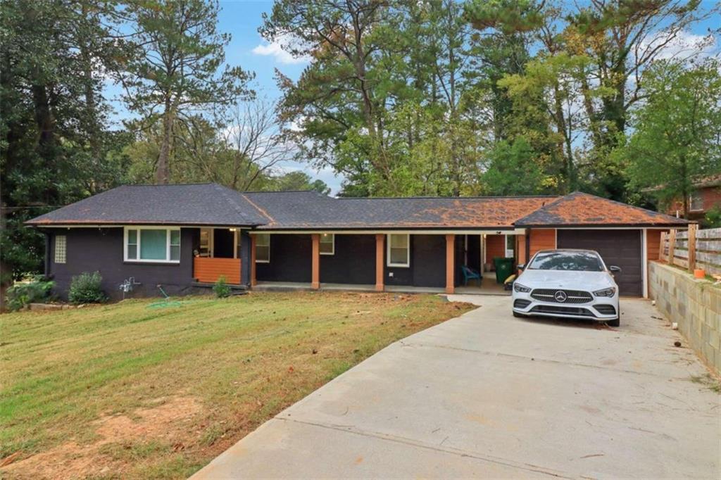 front view of a house with yard