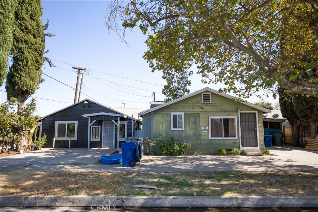 a front view of a house with yard