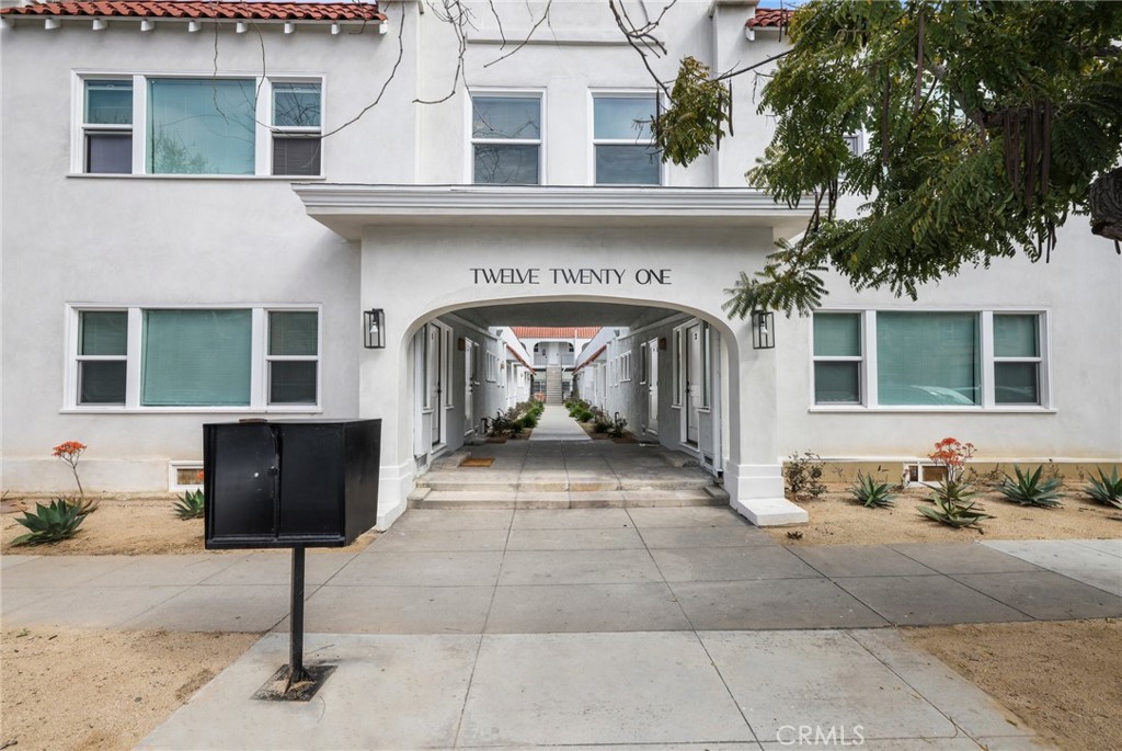 a front view of a house with parking