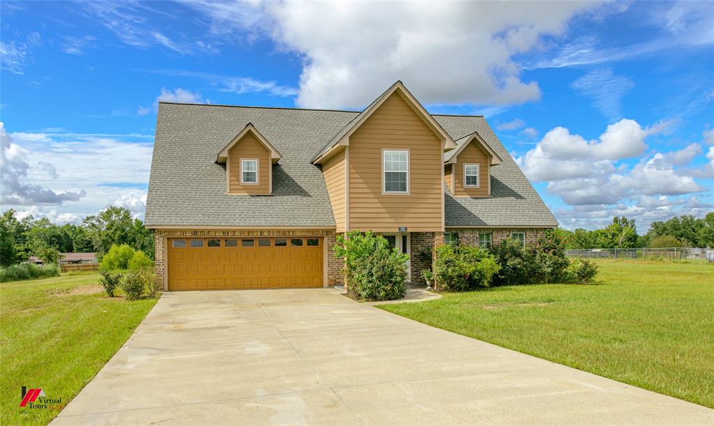 a front view of house with yard