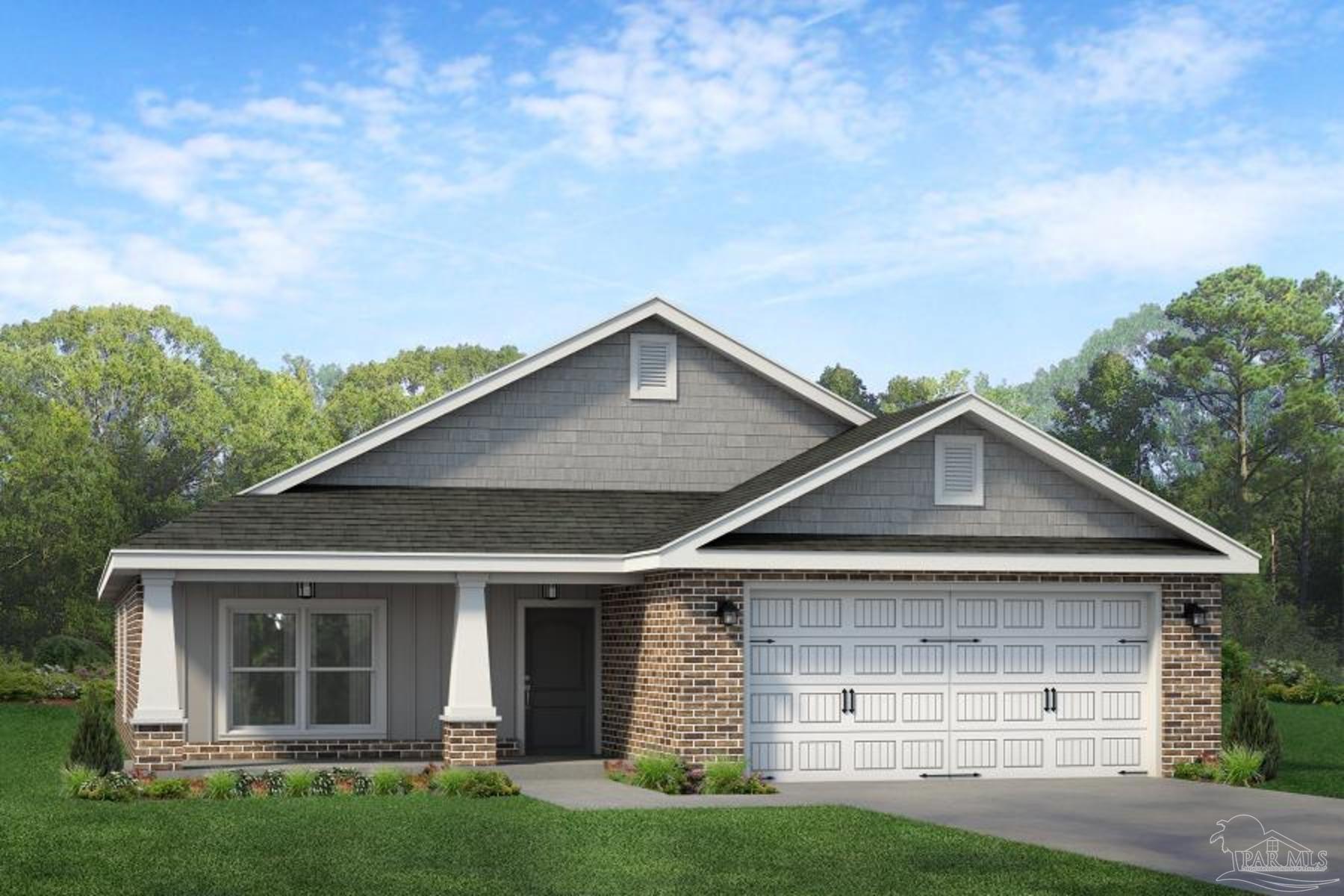 a front view of a house with garage