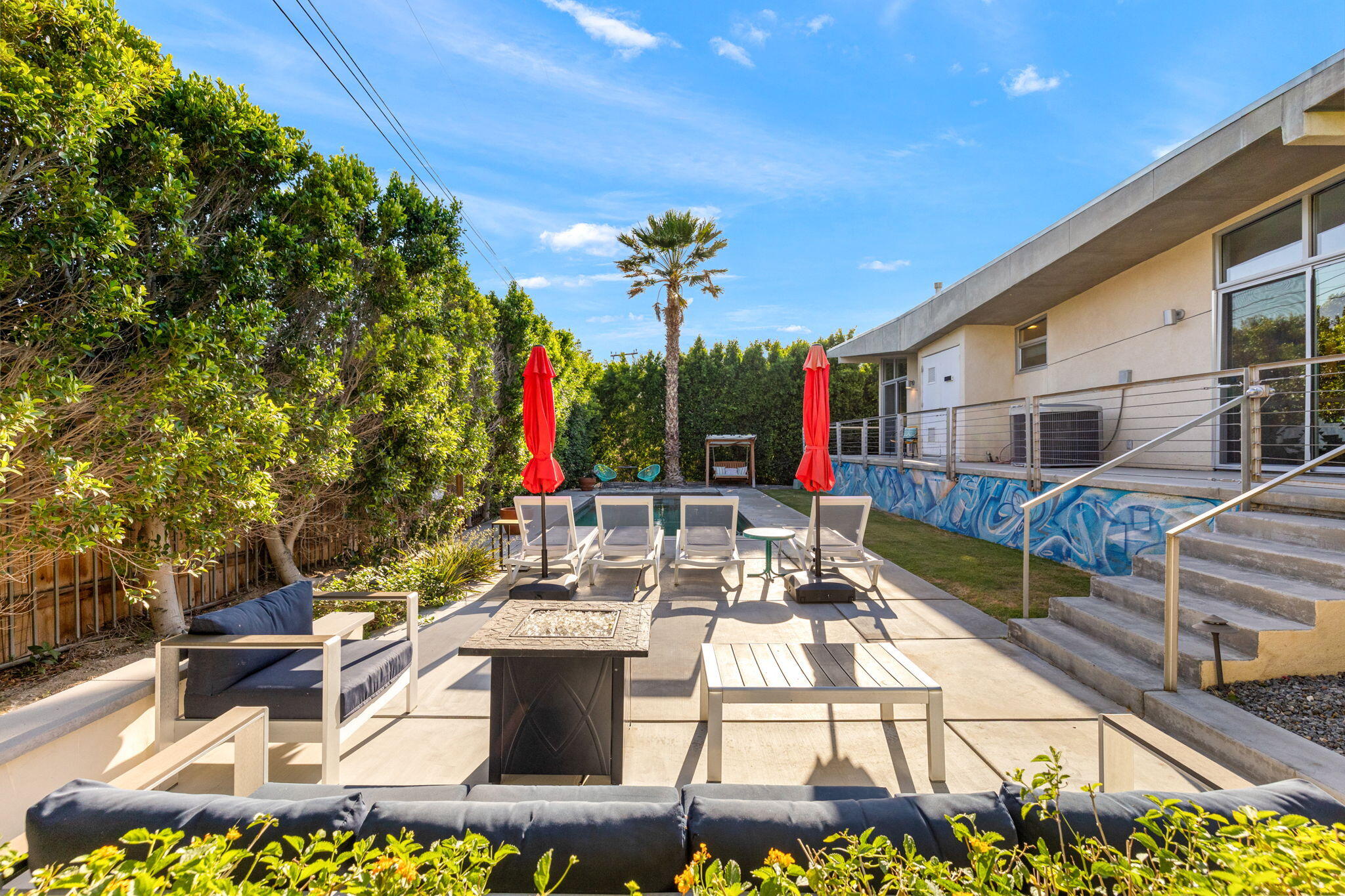 a view of yard with patio