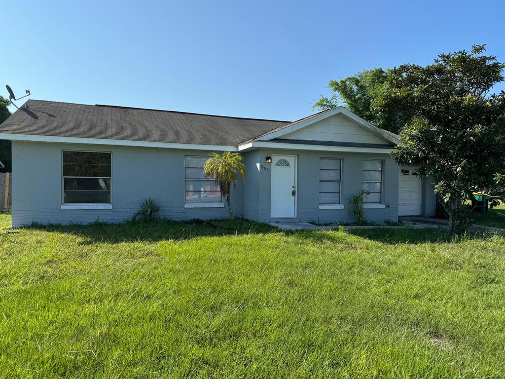 front view of house with a yard