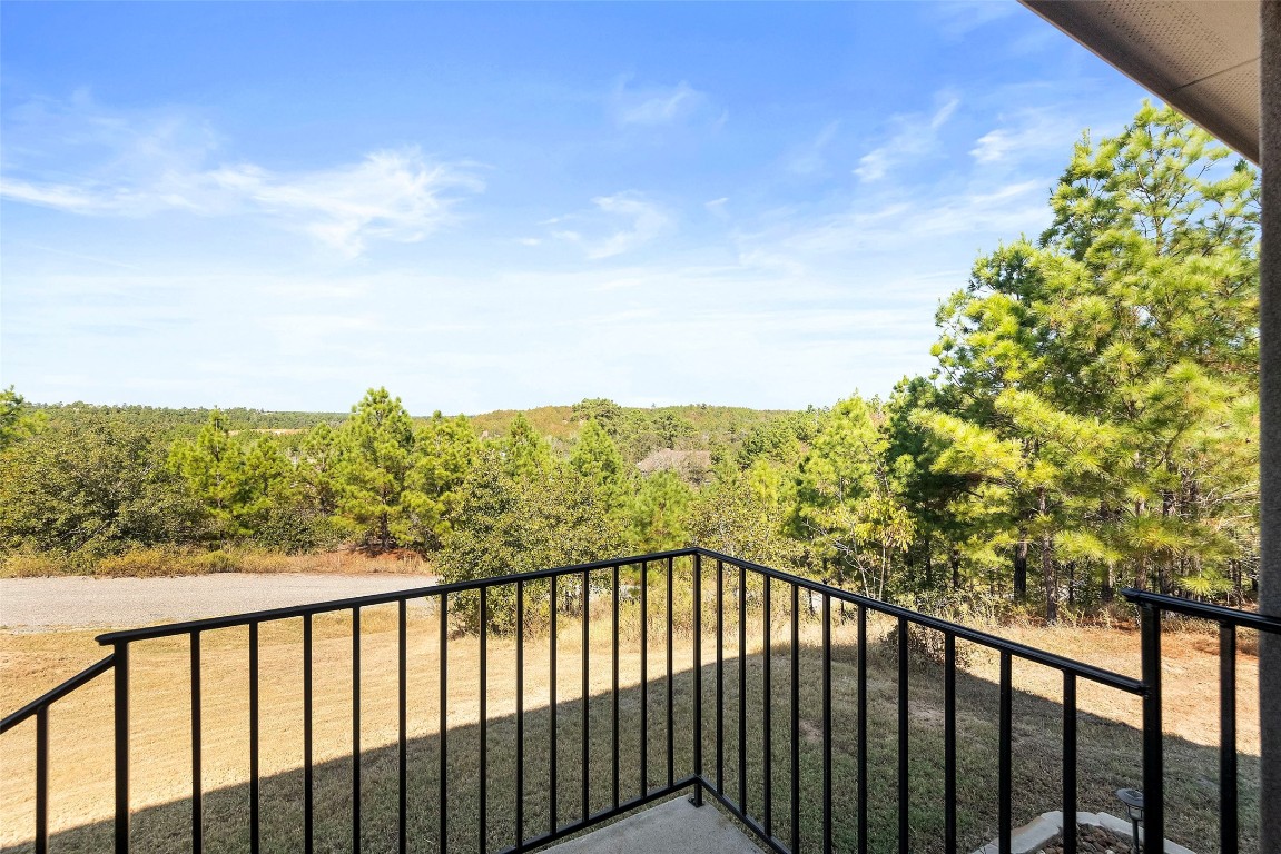 a view of a balcony with an outdoor space