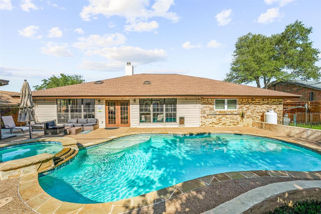 a view of a house with a swimming pool