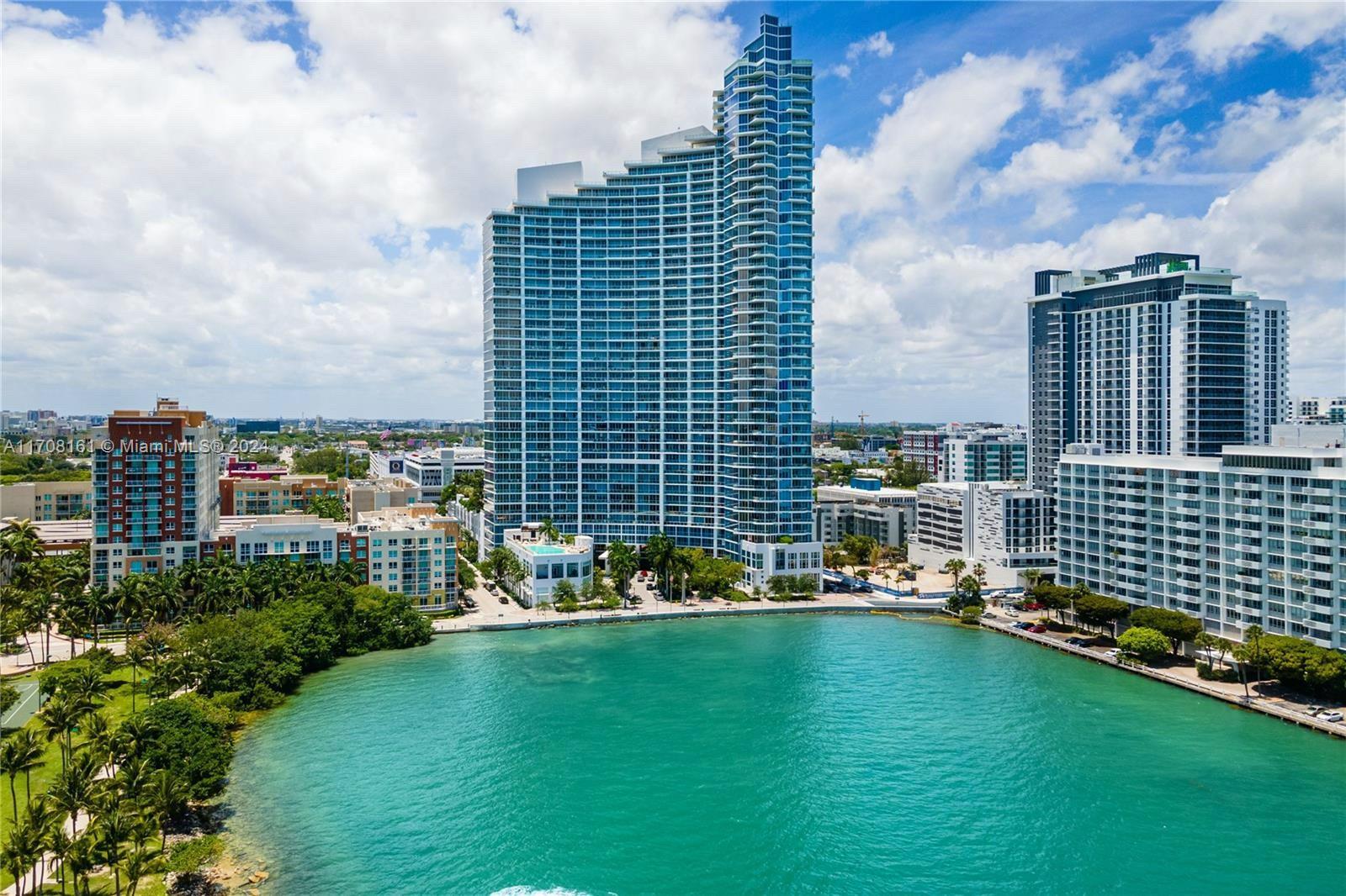 a view of a city with tall buildings