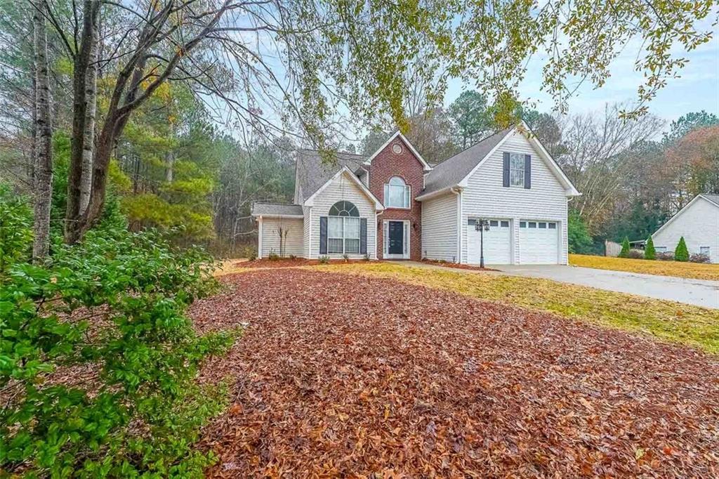 a house with trees in the background