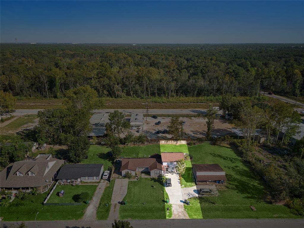 an aerial view of a house with a garden