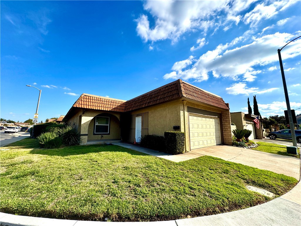 a view of a house with a big yard