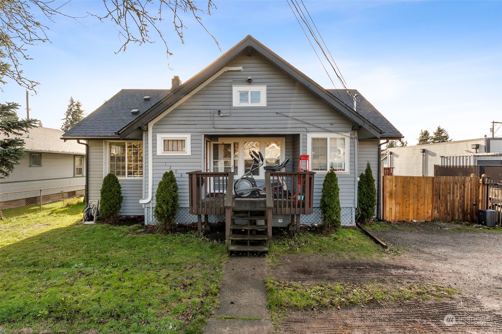 a view of a house with a chairs in patio