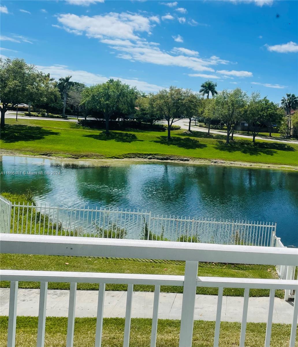 a view of lake from a balcony