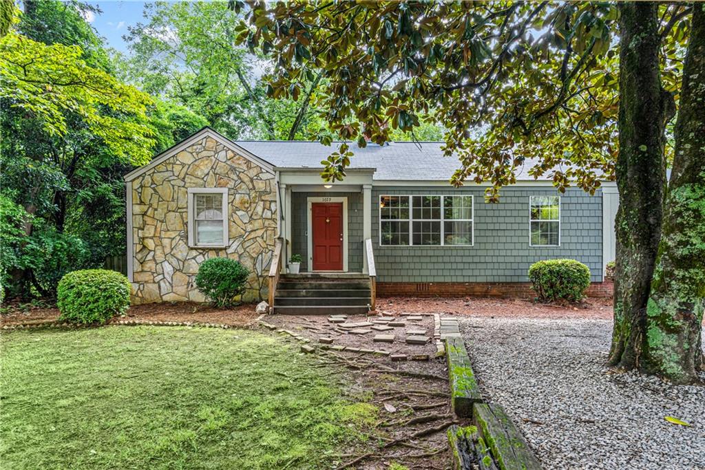 front view of a house with a yard