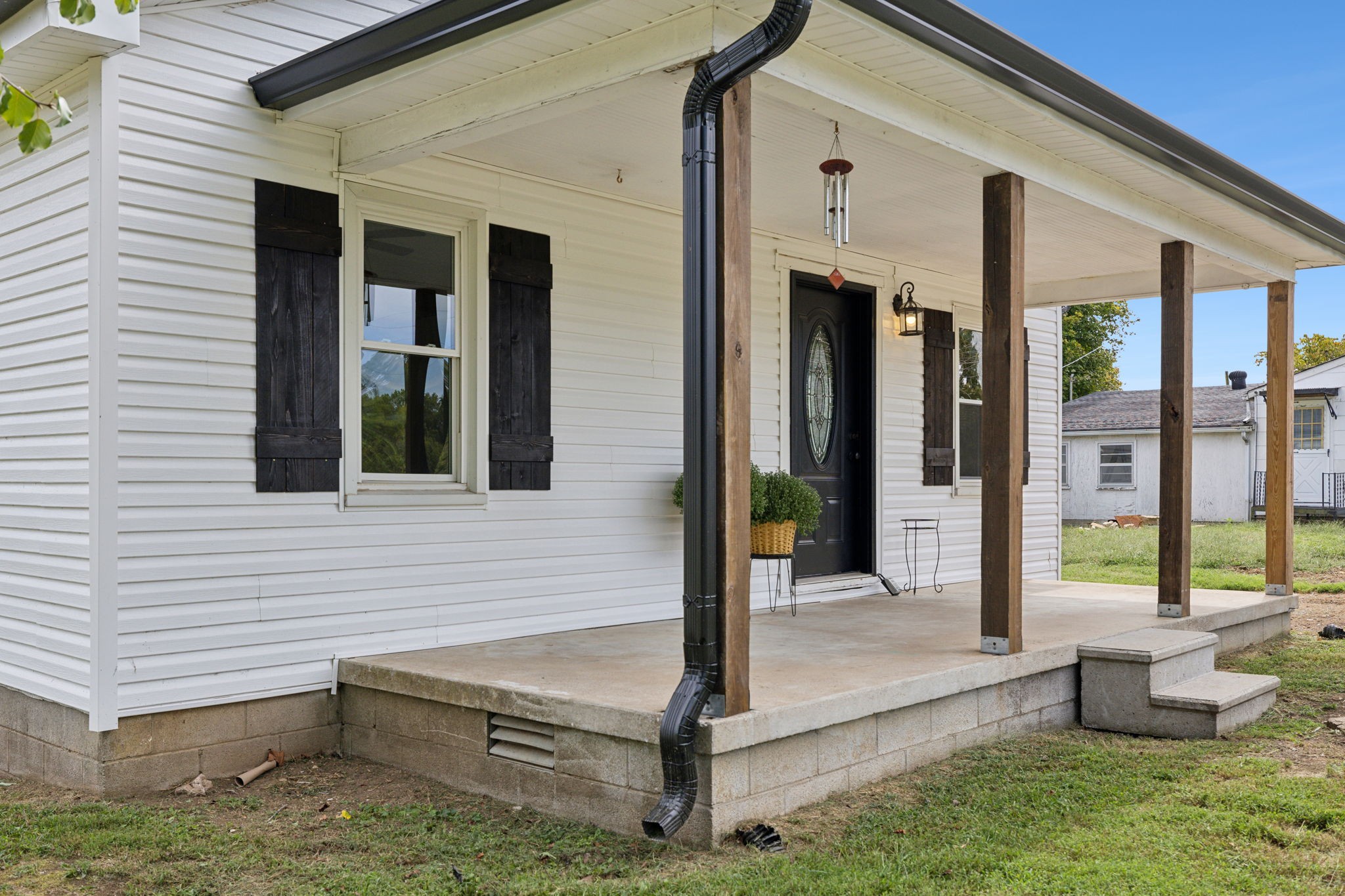 a front view of a house with a porch