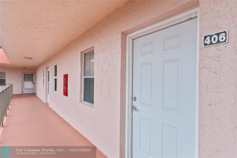 a view of a hallway with entryway