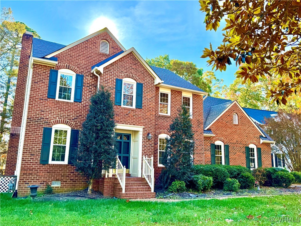 front view of house with a yard