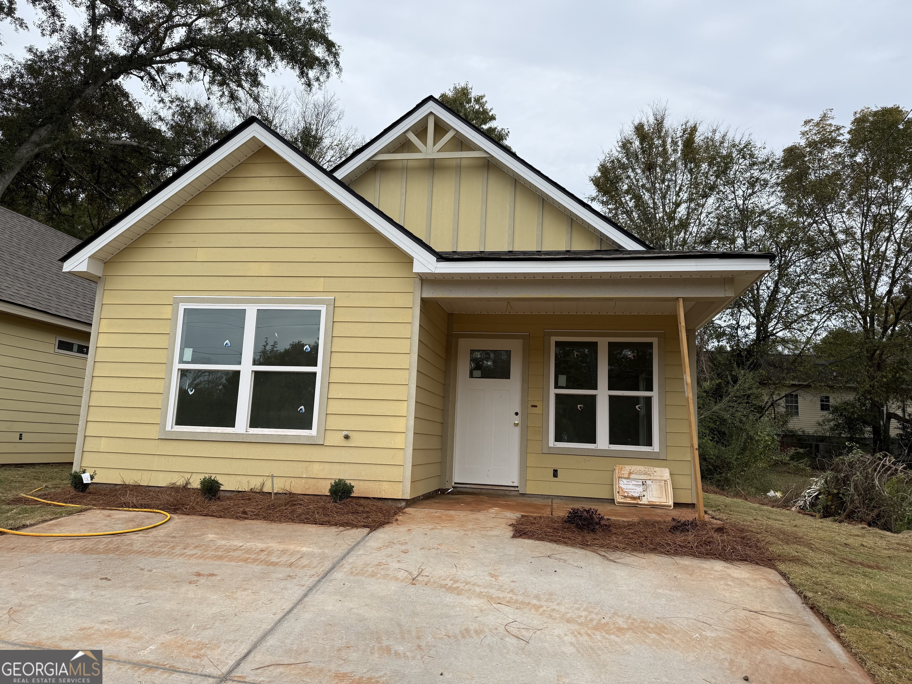 a front view of a house with yard