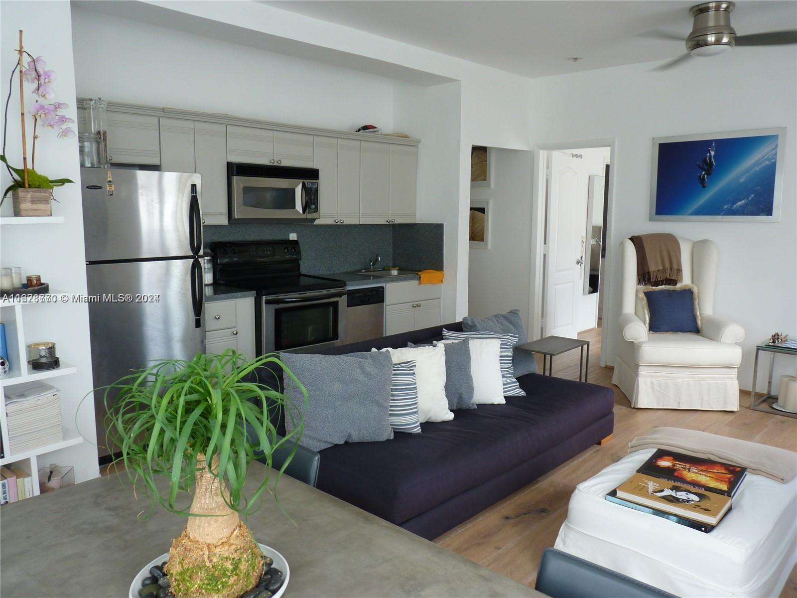 a living room with furniture and a couch