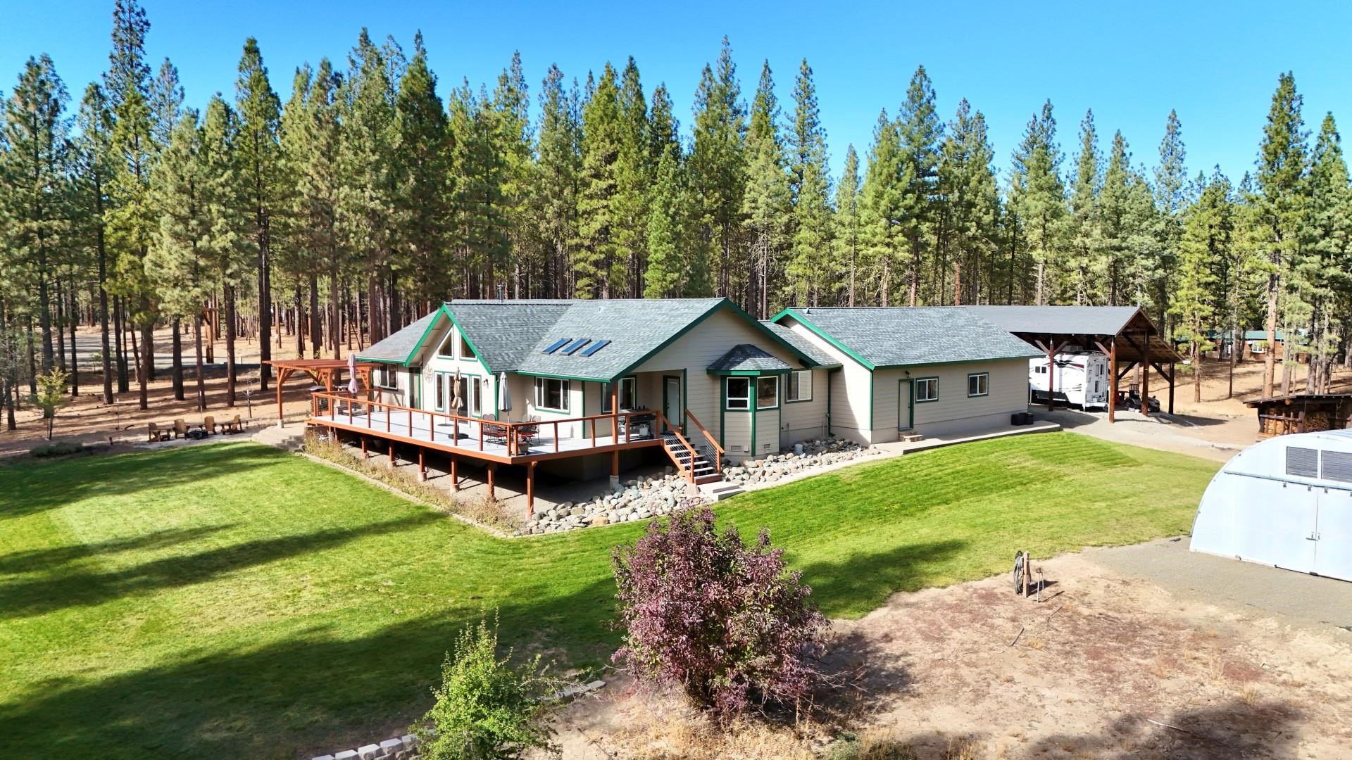 a house with trees in the background