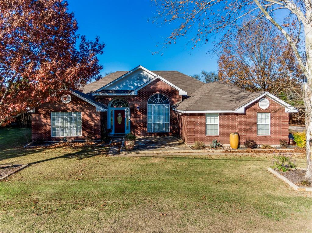 a front view of a house with patio