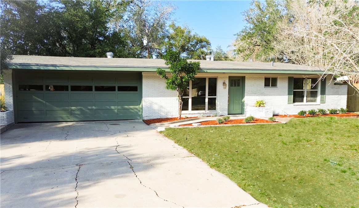 a front view of a house with patio