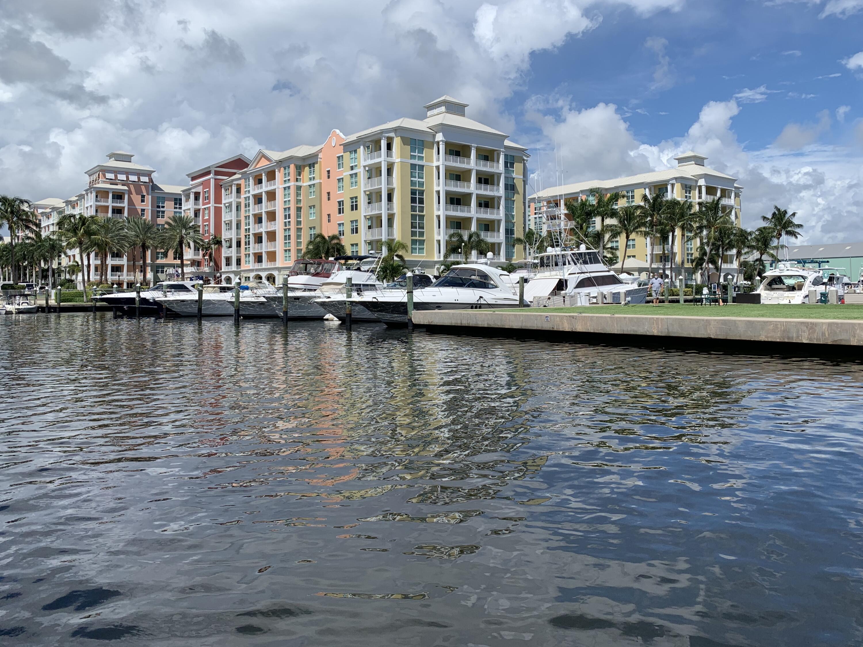 a view of a lake with a large building in the background