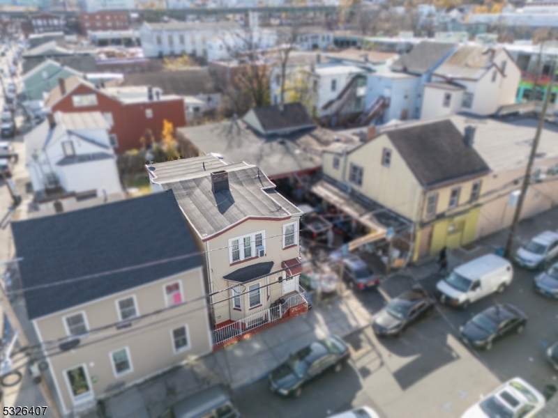 an aerial view of a house with outdoor space