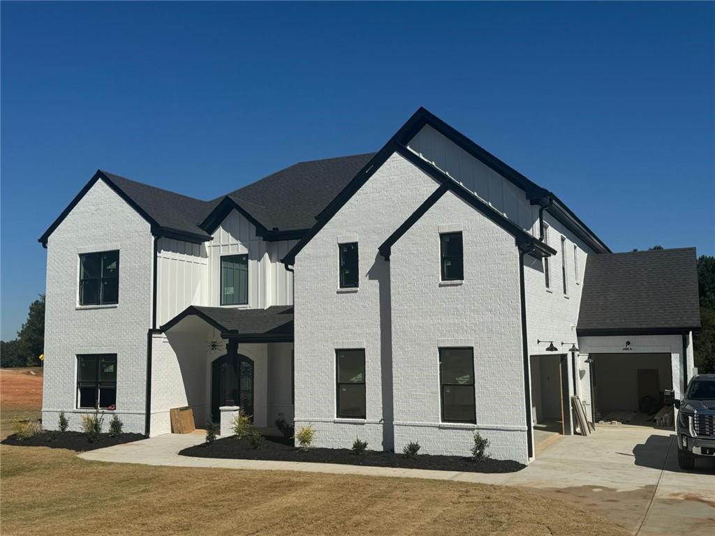 a front view of a house with yard