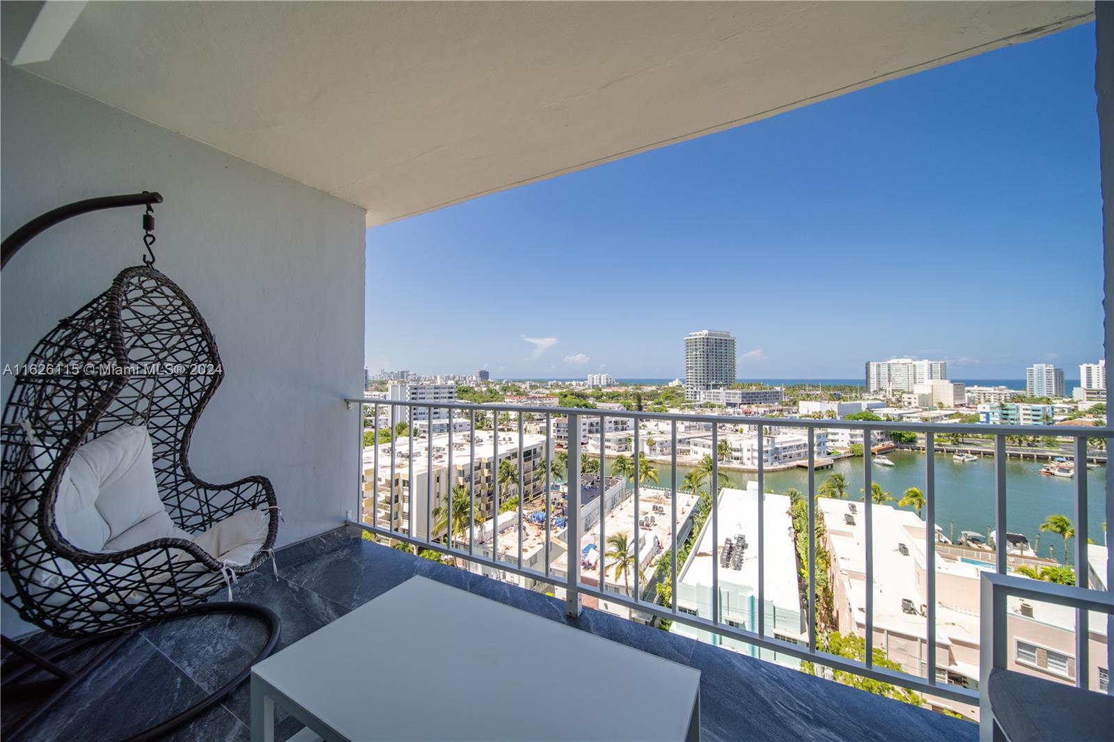 a view of a balcony with furniture