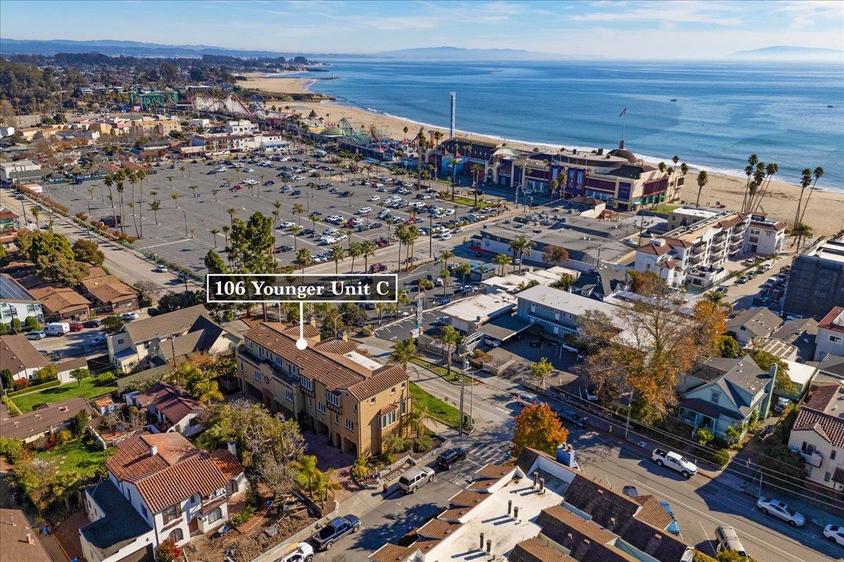 an aerial view of a house with a ocean view