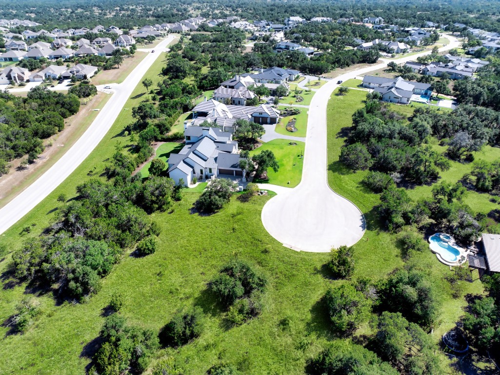 Exclusive, gated community of luxury homes. Virtually enhanced grass.