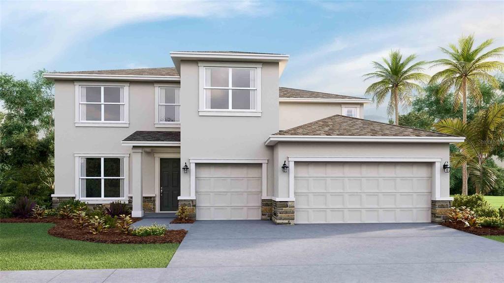 a front view of a house with a yard and garage