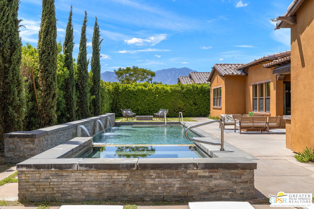 a view of a house with swimming pool