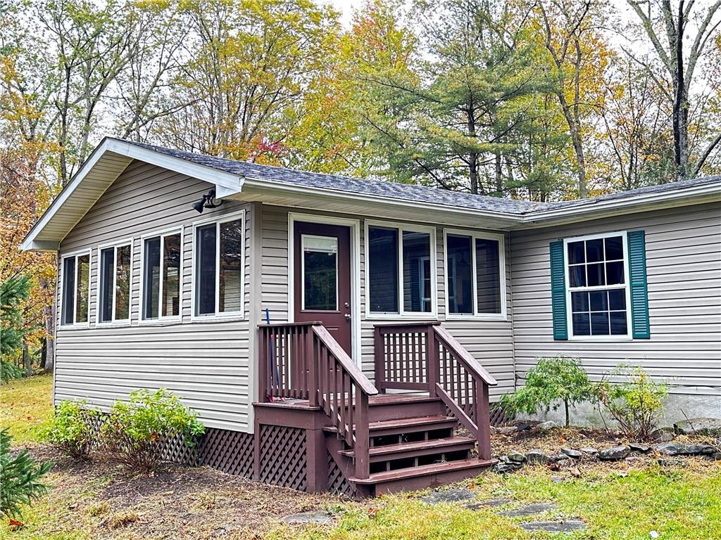 a front view of a house with a porch