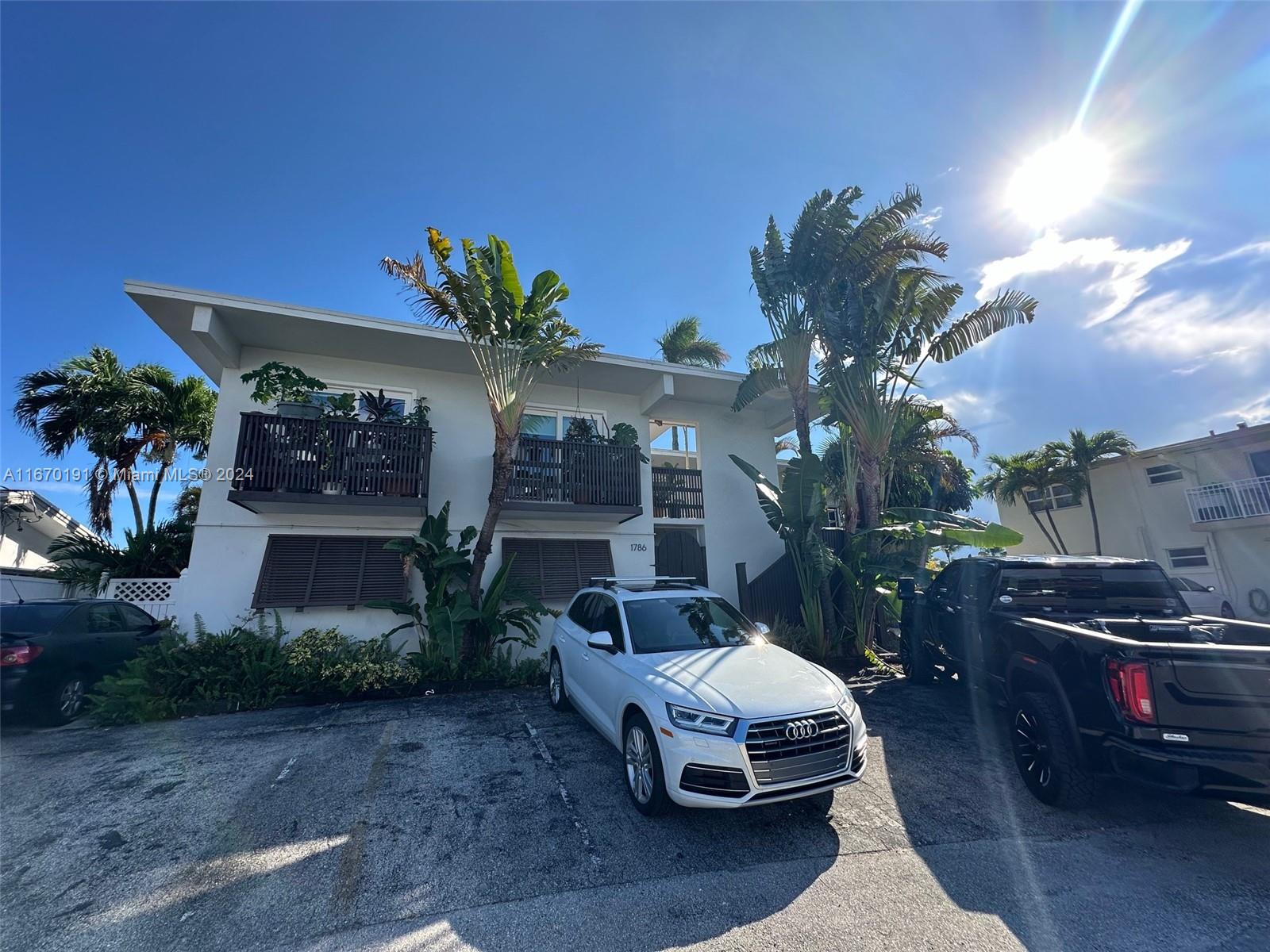 a car parked in front of a house