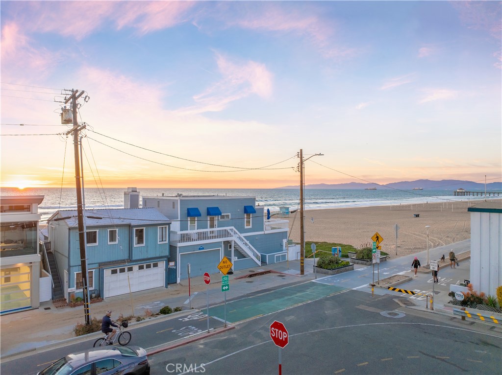 a view of a city street from a roof