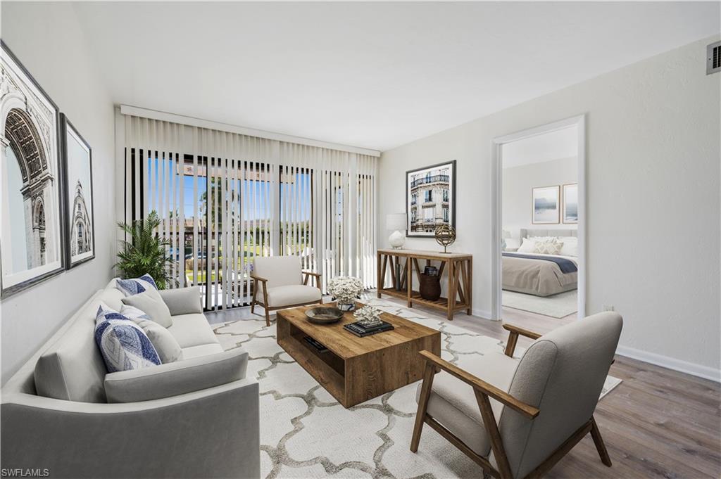 Living room featuring hardwood / wood-style floors*FURNITURE IS VIRTUAL