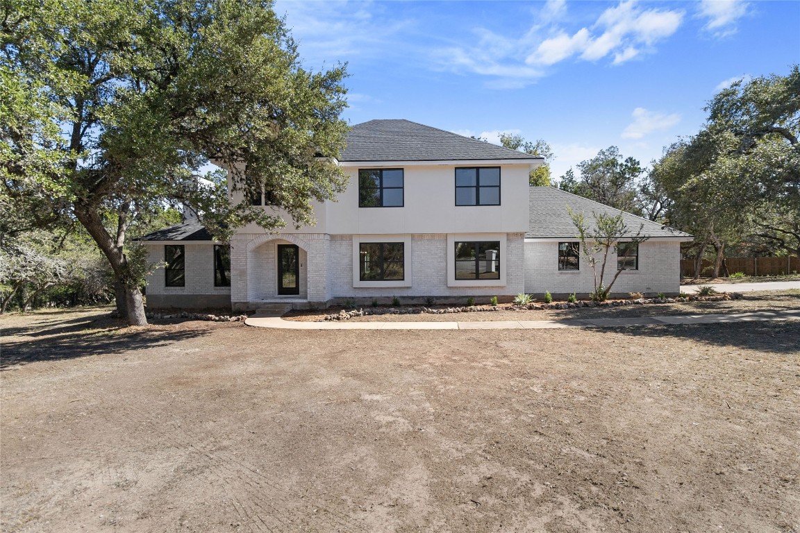 a view of a yard in front of a house