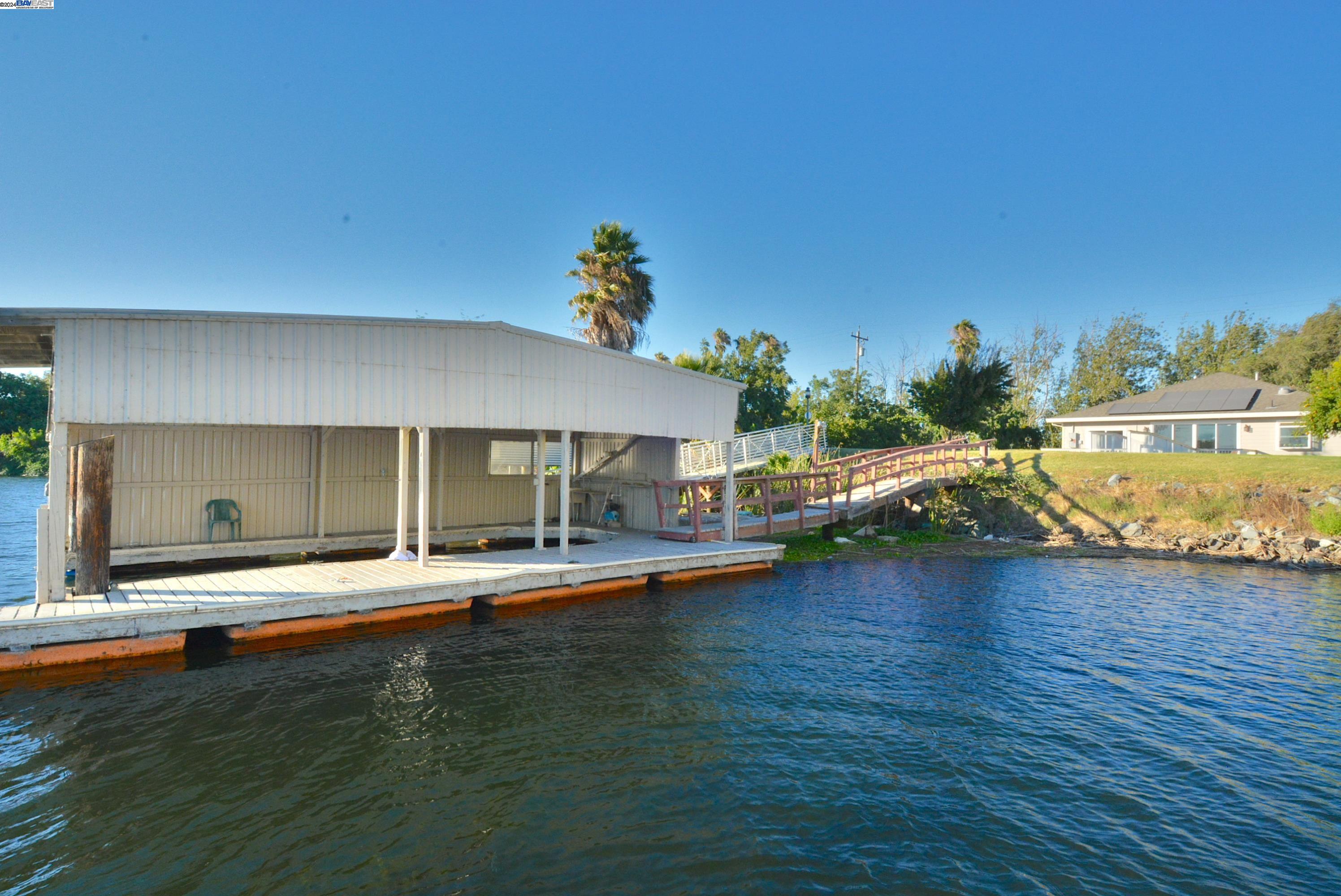 a view of a swimming pool with lounge chair