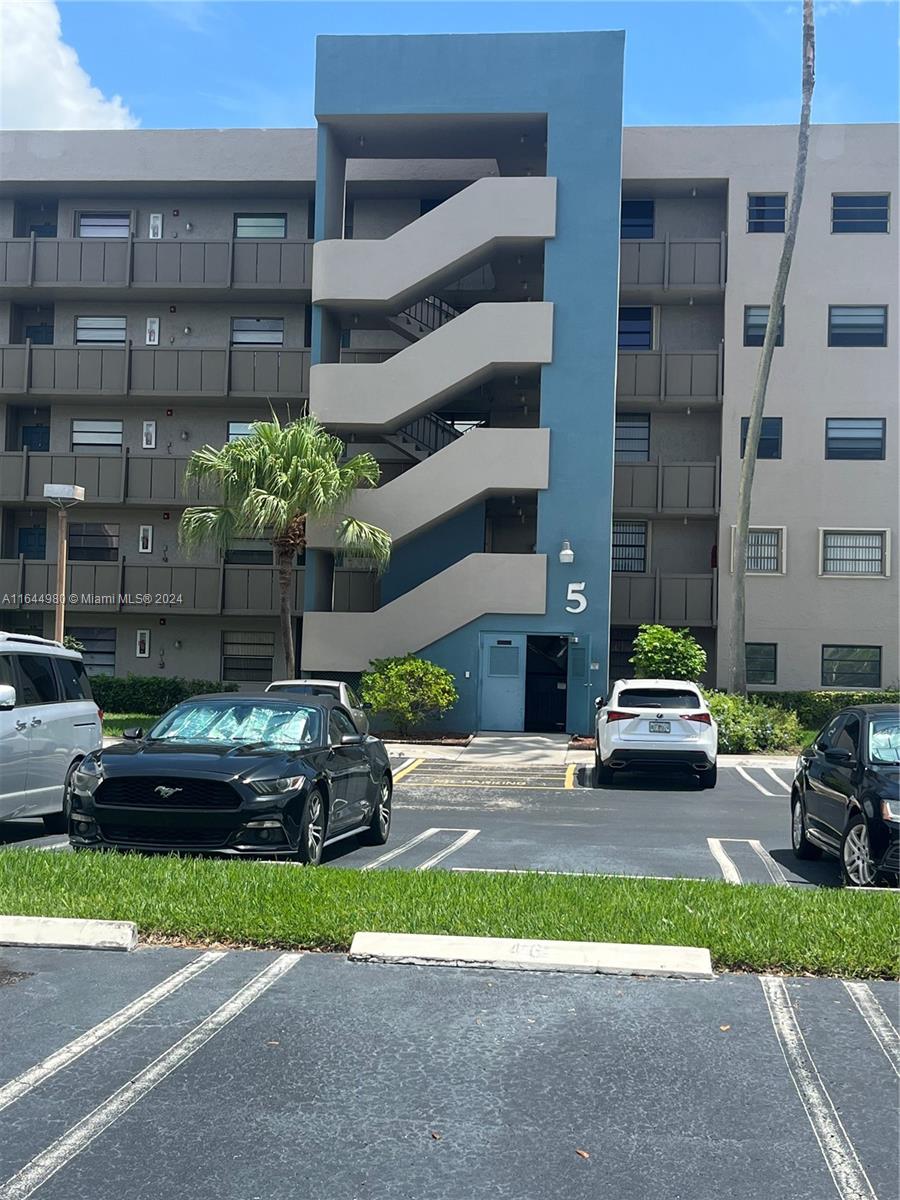 a car parked in front of a building