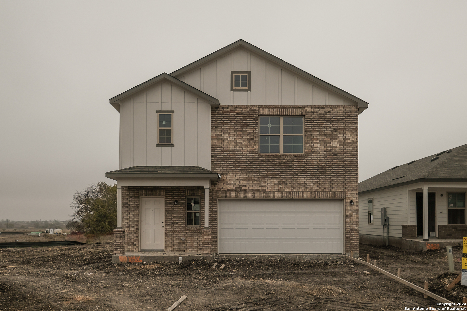 a front view of house with yard