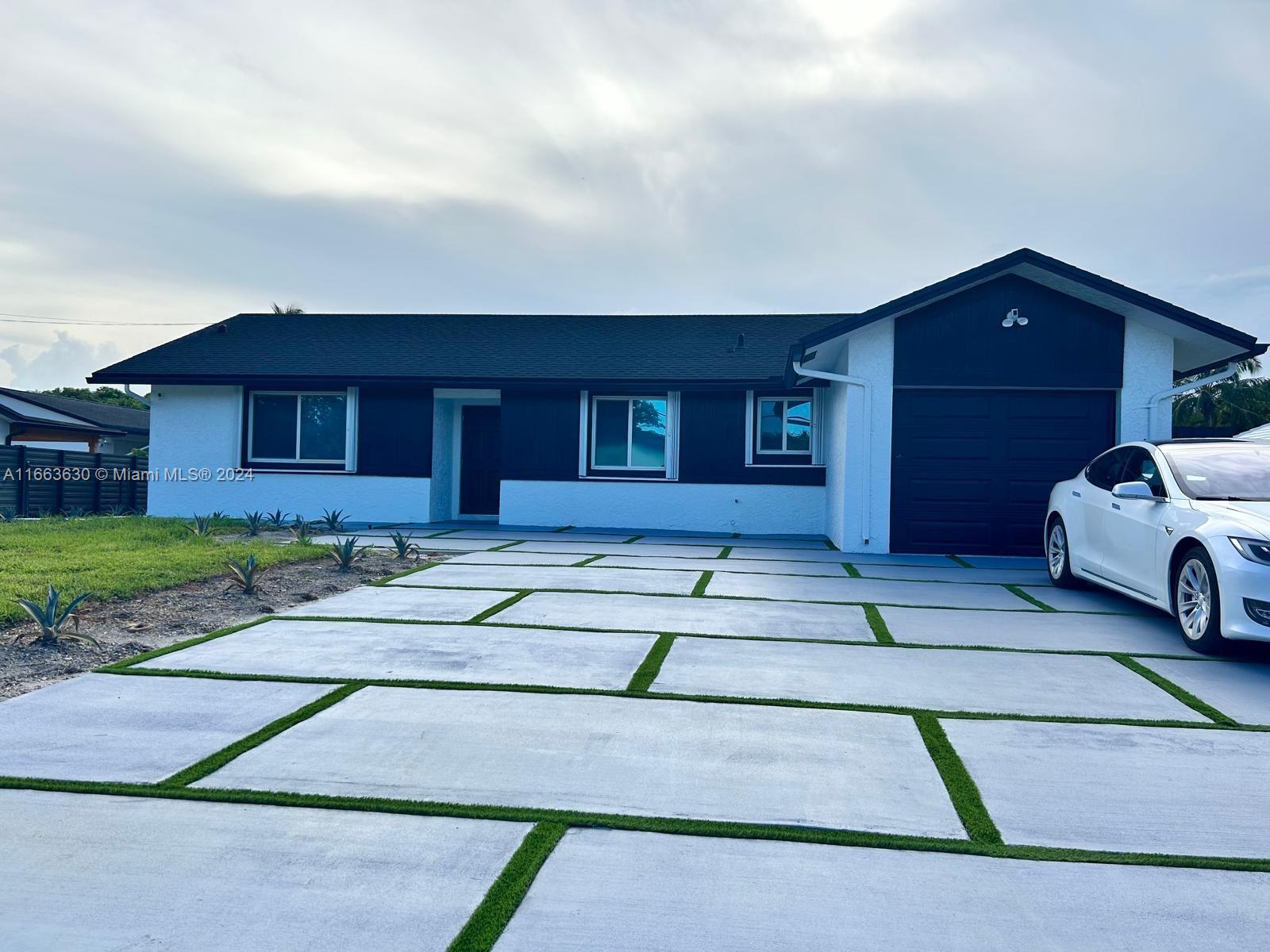 a house view with a outdoor space