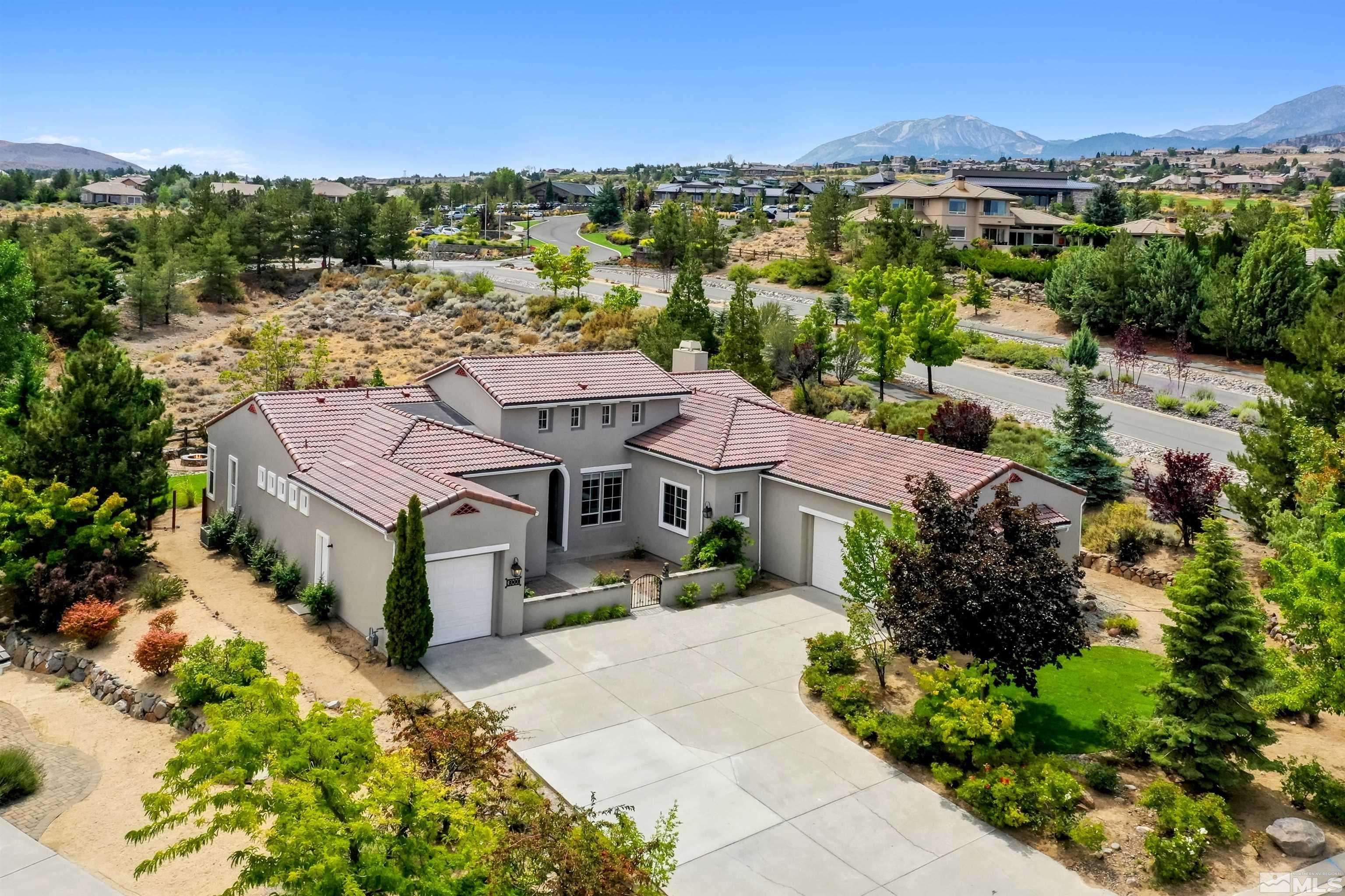 an aerial view of a house with a garden