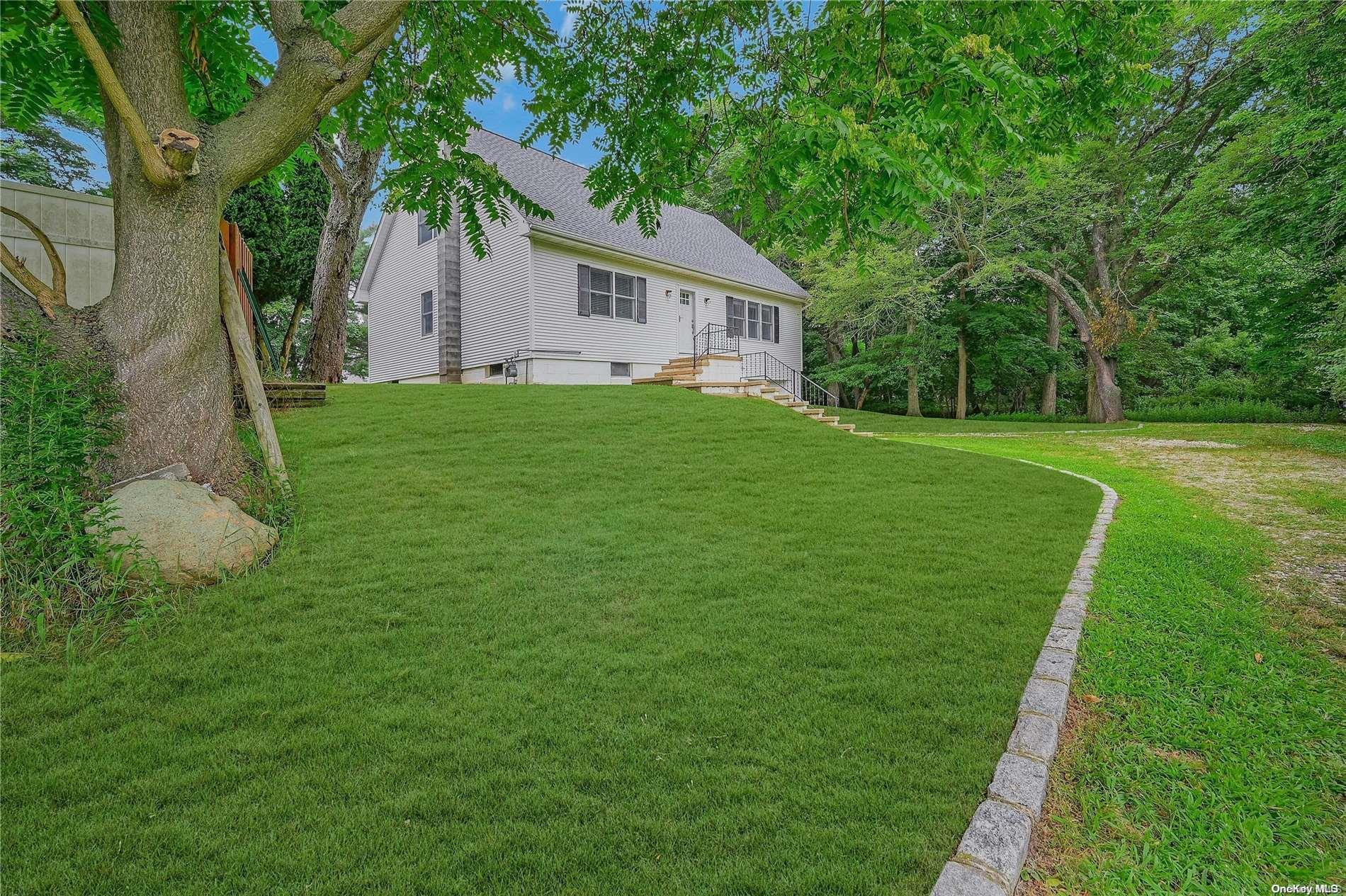 a house view with a garden space