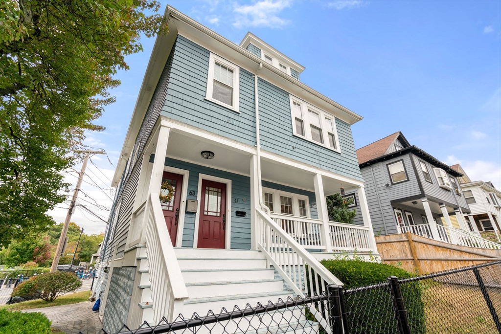 a view of a house with a iron stairs