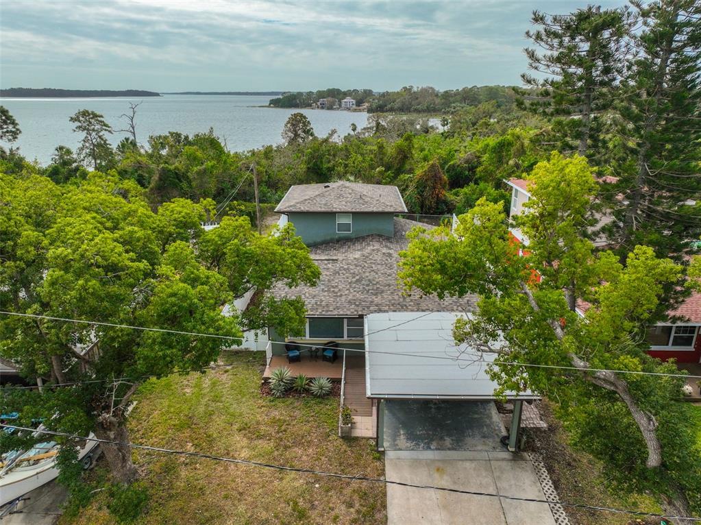 an aerial view of a house with a garden view